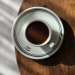 aesthetic overhead view of espresso cup on wooden table